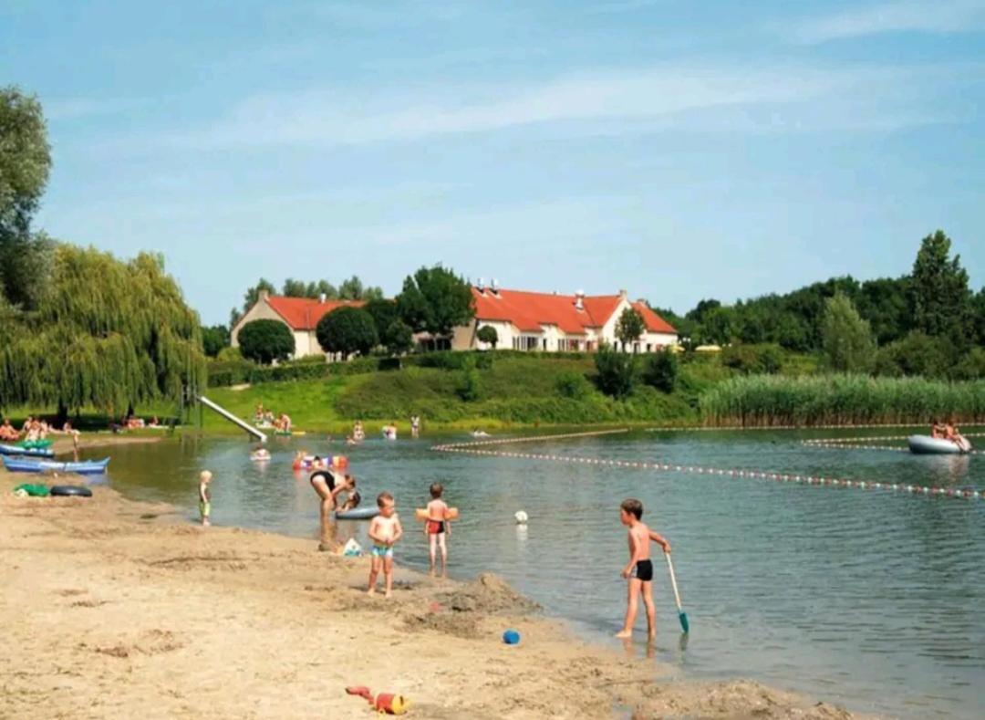7 Person House With Garden, Firepit, Swimming Lake, Hammock, Child Friendly, In- And Outside Playground, Slide, And Great Coffee Ewijk Eksteriør billede